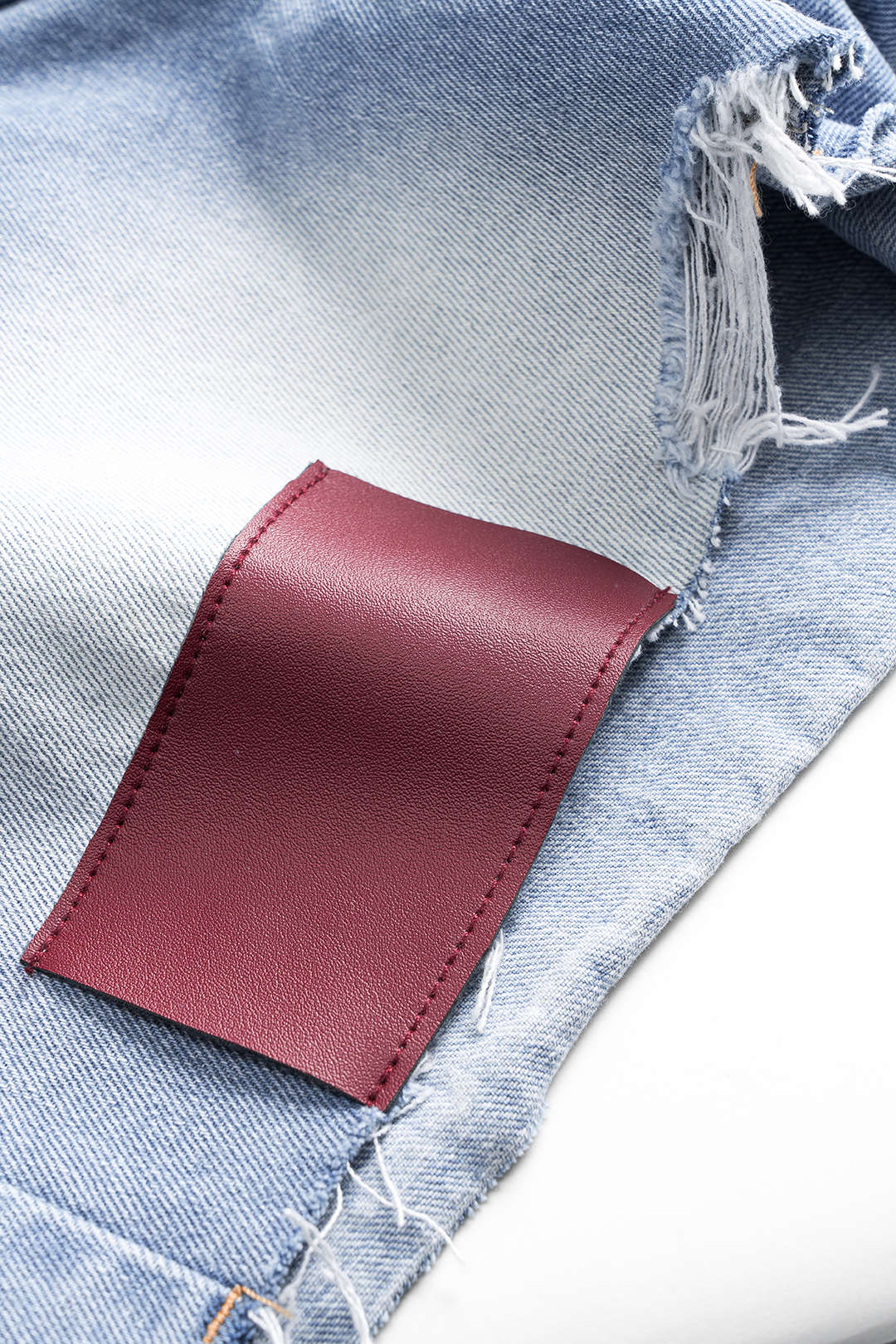 Denim Asymmetrical Button Pocket Ripped Shorts