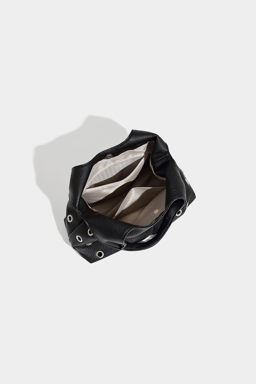 Hollow Studded Clutch Bag